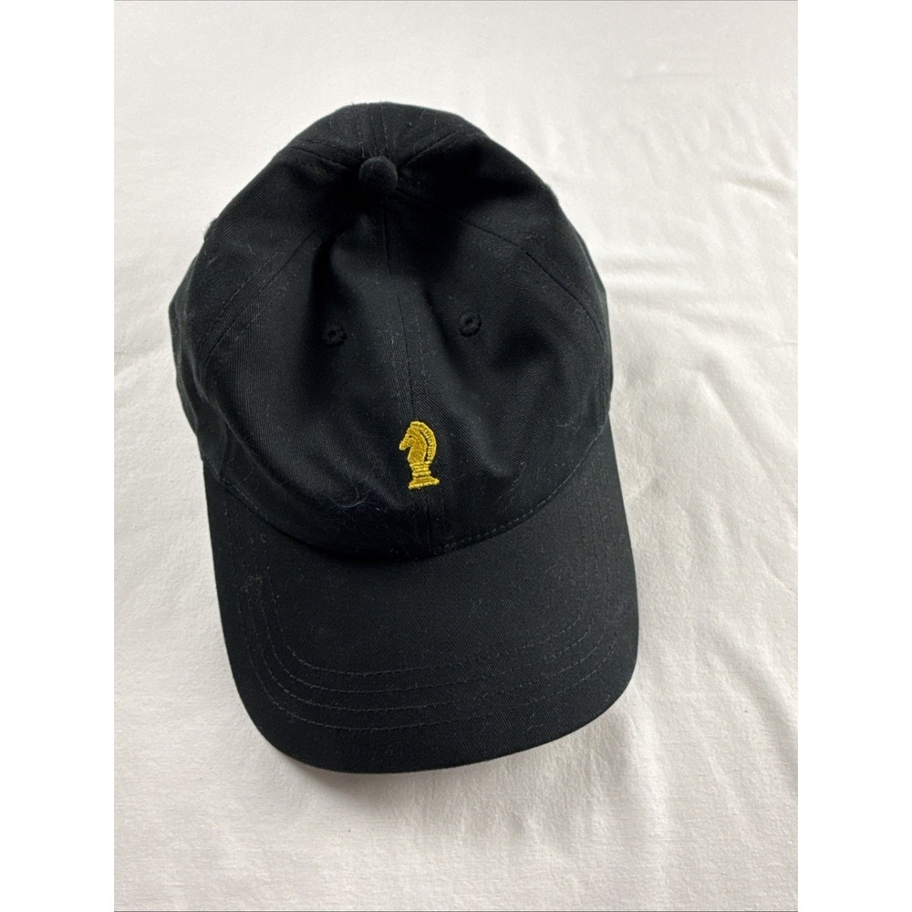 Unisex Lord Abbett black hat w/ embroidered chess piece. Black and gold.